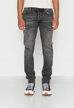 AllSaints REX DAMAGED - Jeans Tapered Fit - Washed Black