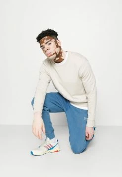 AllSaints NUTOPIA - Tracksuit Bottoms - Natural Indigo -AllSaintsSales d84797a5d99f47159148d03c444badf9